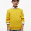 Maglione a trecce per bambina