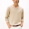Maglione a V con logo in tinta unita Maglione a V con logo in tinta unita