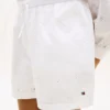 Pantaloncini con ricami e occhielli per bambini