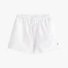 Pantaloncini con ricami e occhielli per bambini