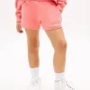 Pantaloncini da bambina con logo Tommy glitterato Pantaloncini da bambina con logo Tommy glitterato