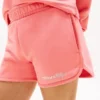 Pantaloncini da bambina con logo Tommy glitterato Pantaloncini da bambina con logo Tommy glitterato