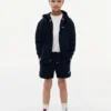 Pantaloncini in felpa con logo bandiera tono su tono per bambini Pantaloncini in felpa con logo bandiera tono su tono per bambini
