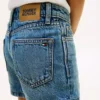 Pantaloncini skinny in denim per bambini Pantaloncini skinny in denim per bambini