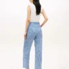 Pantaloni affusolati in seersucker a quadretti con cintura Pantaloni affusolati in seersucker a quadretti con cintura