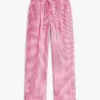Pantaloni affusolati in seersucker a quadretti con cintura Pantaloni affusolati in seersucker a quadretti con cintura