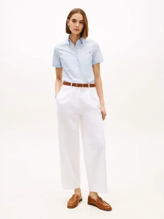 Pantaloni chino a zampa in twill a pieghe