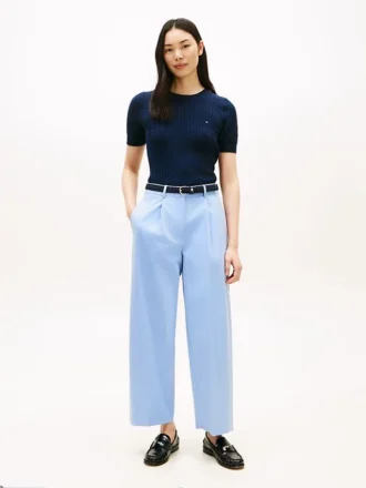 Pantaloni chino a zampa in twill a pieghe