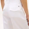 Pantaloni chino a zampa in twill a pieghe