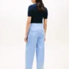 Pantaloni chino a zampa in twill a pieghe Pantaloni chino a zampa in twill a pieghe