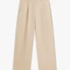 Pantaloni chino a zampa in twill a pieghe Pantaloni chino a zampa in twill a pieghe