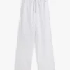 Pantaloni da notte a righe in seersucker Pantaloni da notte a righe in seersucker