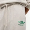 Pantaloni della tuta in spugna con logo script dal taglio morbido Pantaloni della tuta in spugna con logo script dal taglio morbido