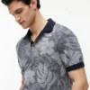 Polo a maniche corte con stampa tropicale Polo a maniche corte con stampa tropicale