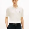 Polo a maniche corte in maglia a trecce Polo a maniche corte in maglia a trecce