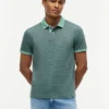 Polo a righe in interlock dalla vestibilità regolare