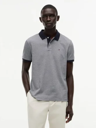 Polo a righe in interlock dalla vestibilità regolare