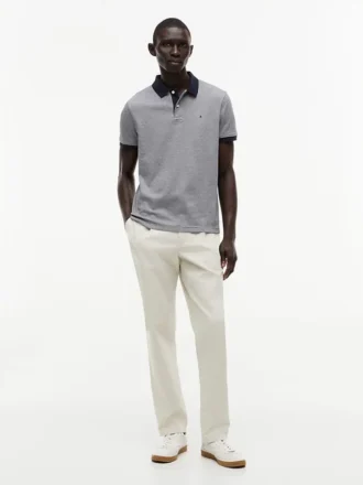 Polo a righe in interlock dalla vestibilità regolare