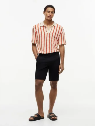 Polo a righe in maglia larga dal taglio classico