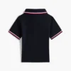Polo con bordi a contrasto per neonati Polo con bordi a contrasto per neonati