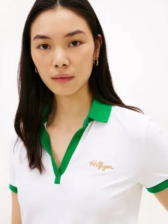 Polo con logo ricamato in stile script