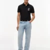 Polo con logo Tommy x Cadillac F1® Team Polo con logo Tommy x Cadillac F1® Team