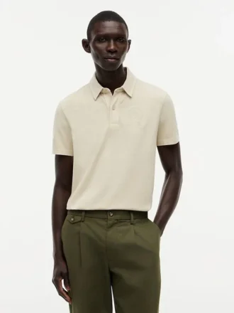 Polo con stemma tinta in capo, vestibilità regolare