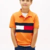 Polo elasticizzata con bandiera a blocchi di colore per bambini Polo elasticizzata con bandiera a blocchi di colore per bambini