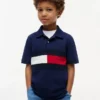 Polo elasticizzata con bandiera a blocchi di colore per bambini Polo elasticizzata con bandiera a blocchi di colore per bambini