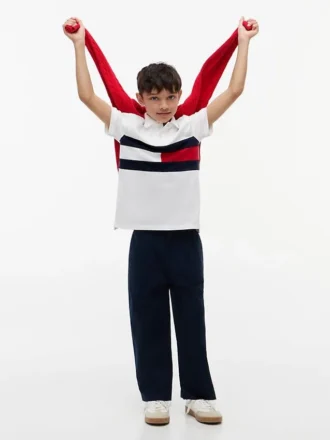 Polo elasticizzata con bandiera a blocchi di colore per bambini