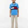Polo elasticizzata con bandiera a blocchi di colore per bambini Polo elasticizzata con bandiera a blocchi di colore per bambini