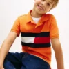Polo elasticizzata con bandiera a blocchi di colore per bambini Polo elasticizzata con bandiera a blocchi di colore per bambini