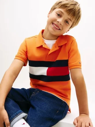 Polo elasticizzata con bandiera a blocchi di colore per bambini