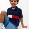 Polo elasticizzata con bandiera a blocchi di colore per bambini Polo elasticizzata con bandiera a blocchi di colore per bambini