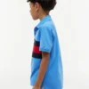 Polo elasticizzata con bandiera a blocchi di colore per bambini Polo elasticizzata con bandiera a blocchi di colore per bambini