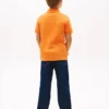 Polo elasticizzata con bandiera a blocchi di colore per bambini Polo elasticizzata con bandiera a blocchi di colore per bambini