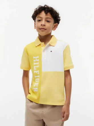 Polo elasticizzata con logo a blocchi di colore per bambini