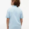 Polo elasticizzata con logo a blocchi di colore per bambini Polo elasticizzata con logo a blocchi di colore per bambini