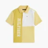 Polo elasticizzata con logo a blocchi di colore per bambini Polo elasticizzata con logo a blocchi di colore per bambini
