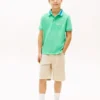 Polo elasticizzata con logo Hilfiger per bambini Polo elasticizzata con logo Hilfiger per bambini