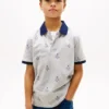 Polo elasticizzata con logo nautico su tutta la superficie per bambini Polo elasticizzata con logo nautico su tutta la superficie per bambini