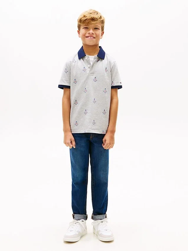 Polo elasticizzata con logo nautico su tutta la superficie per bambini Polo elasticizzata con logo nautico su tutta la superficie per bambini