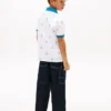 Polo elasticizzata con logo nautico su tutta la superficie per bambini Polo elasticizzata con logo nautico su tutta la superficie per bambini