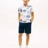 Polo elasticizzata con logo su tutta la superficie per bambini Polo elasticizzata con logo su tutta la superficie per bambini