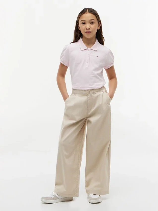 Polo elasticizzata con maniche a sbuffo per bambini Polo elasticizzata con maniche a sbuffo per bambini