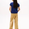Polo elasticizzata con maniche a sbuffo per bambini Polo elasticizzata con maniche a sbuffo per bambini
