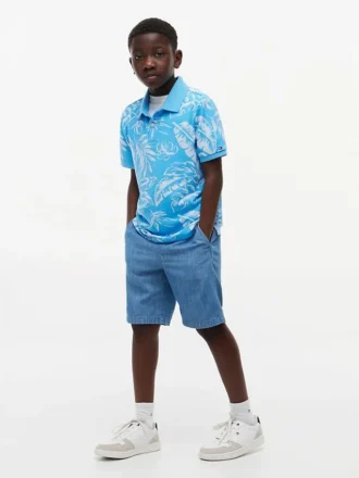 Polo elasticizzata con stampa tropicale per bambini