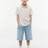 Polo elasticizzata con stampa tropicale per bambini Polo elasticizzata con stampa tropicale per bambini