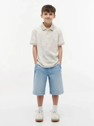 Polo elasticizzata con stampa tropicale per bambini