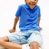 Polo per bambini con stampa bandiera su tutta la superficie Polo per bambini con stampa bandiera su tutta la superficie